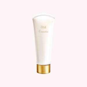 White cosmetic tube labeled 'Milk Cosmetics' with a gold cap.